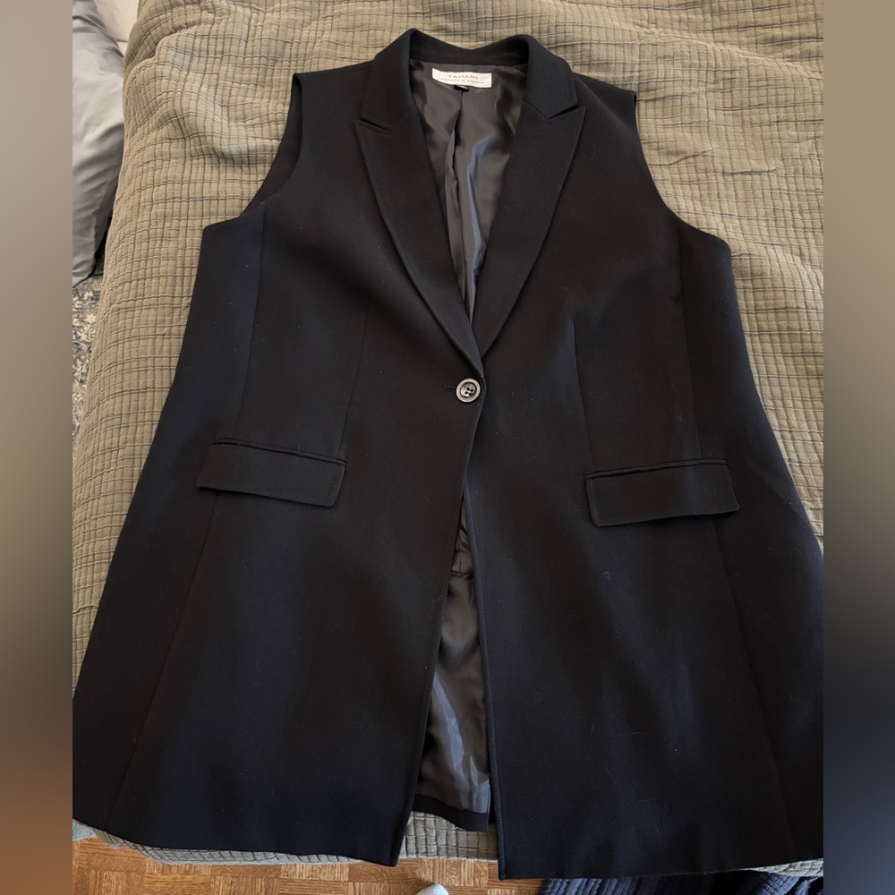 Long, black suit vest from Tahari.
